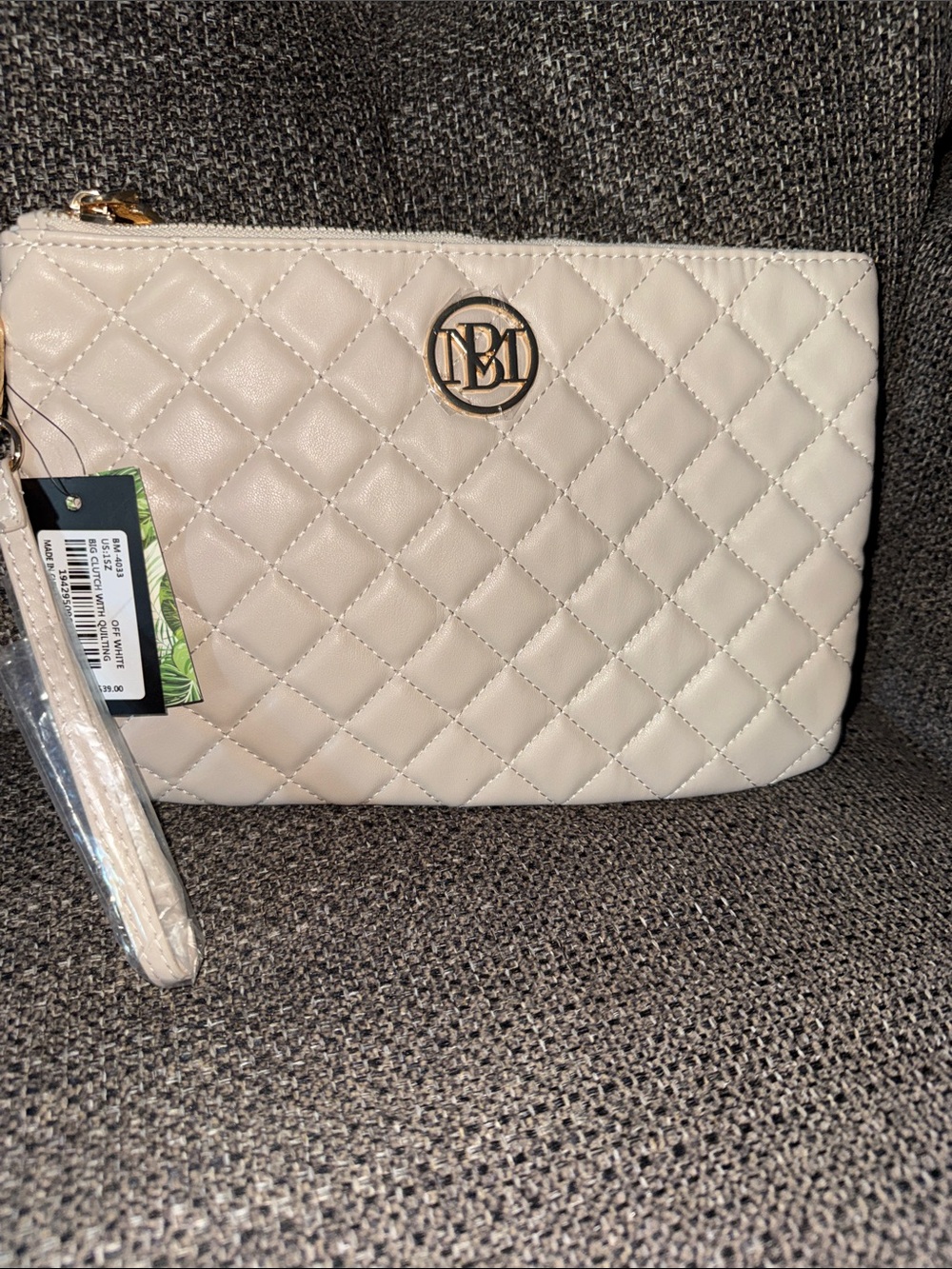 Quilted Wristlet Clutch in Cream with Gold Logo